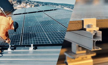 A man placing solar panels on a roof