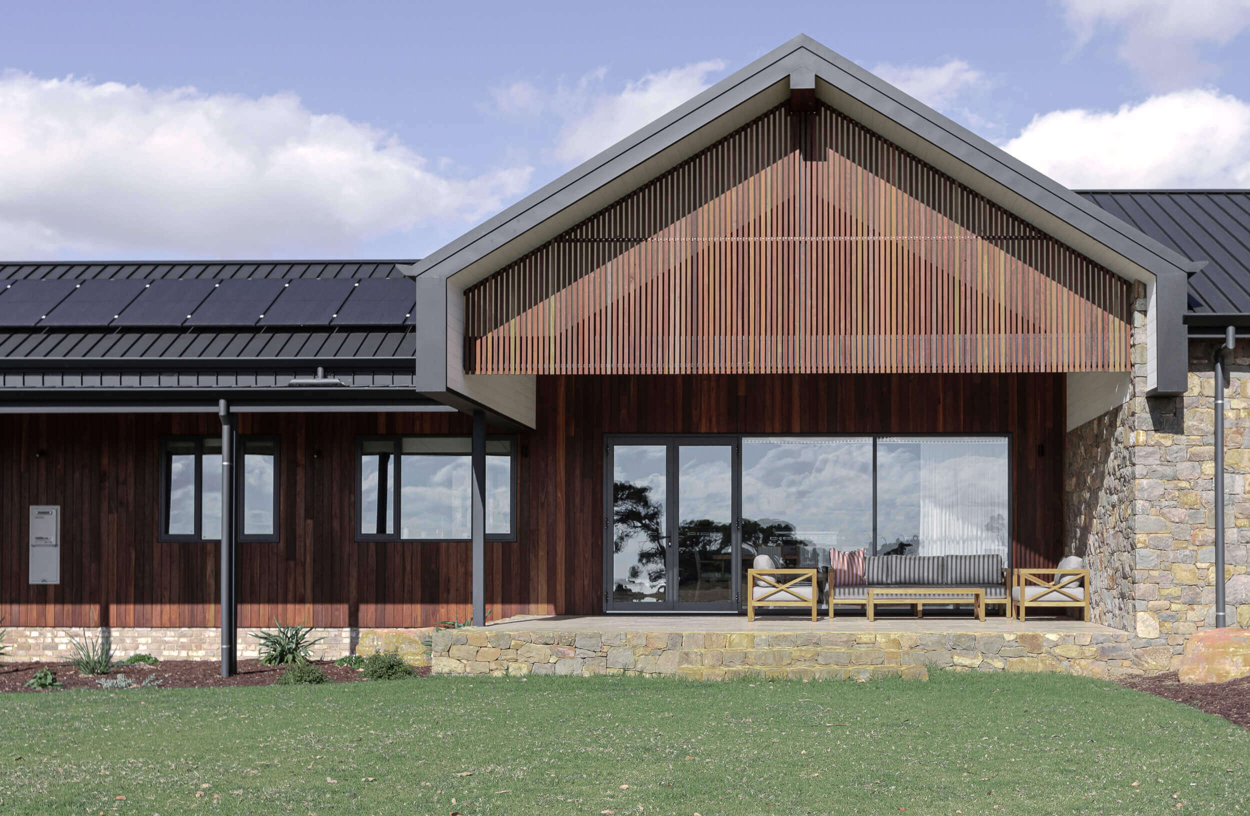 A close up of the front of Wilyabrup Farmhouse featuring Capral building systems