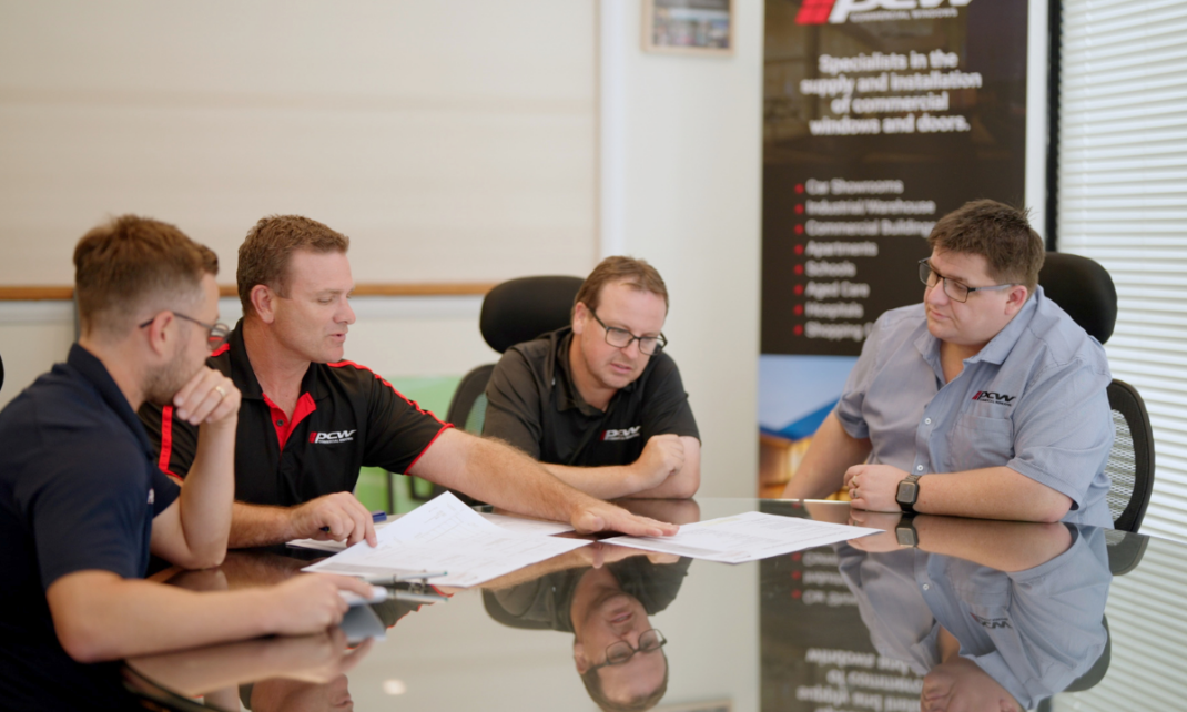 A picture of PCW team discussing quotes