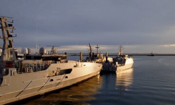 A photo of Austal ships in a clear water setting