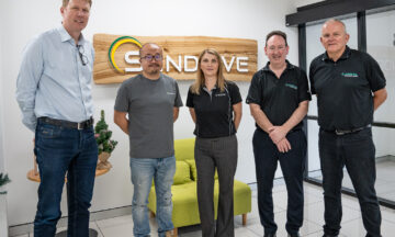 A photo of capral employees and SunDrive Solar together taking a photo recognising their partnership towards sustainability