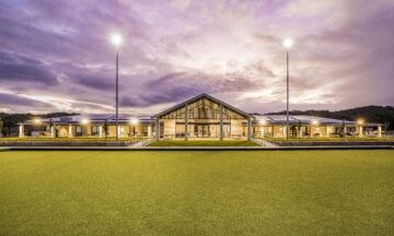 A photo of Monterey Community facility at dusk feautring capral window and door systems.