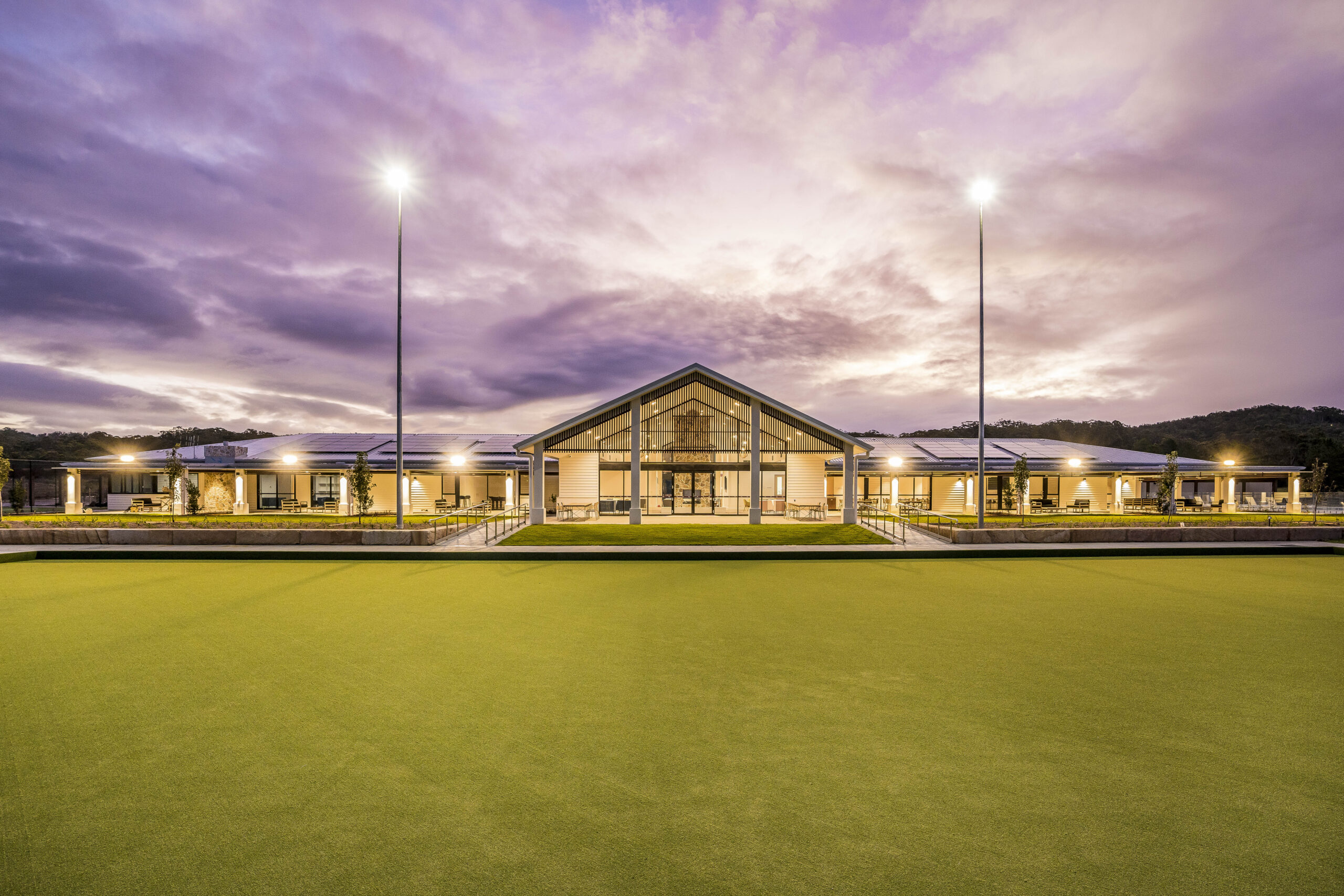 A photo of Monterey Community facility at dusk feautring capral window and door systems.